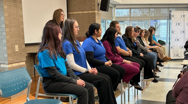 Springfield-Clark Career Technology Students (CTC) students answered questions and participated in the Career Technical Education Month event. In the photo (left to right) are Savanna O’Brien, senior in Digital Media Design from Southeastern; Julia Lookabaugh, senior in Digital Media Design from Springfield City; Katalina Lopez, senior in Medical Assisting from Kenton Ridge; Elise Dunaway, senior in Dental Assisting from Kenton Ridge; David Keeton, senior in Auto Technology & Motorcycle Maintenance from Clark-Shawnee; Kyleigh VanDyne, senior in Veterinary Science from Clark-Shawnee; Gracee Evans, senior in Culinary Arts from Clark-Shawnee; Cristian Portillo, junior in HVAC from Tecumseh; Abigail Campbell, junior in Health Occupations from Greenon; Kadi Brown, junior in Culinary Arts from Greenon; Serenity Allen, senior in EMT from Greenon; and Ricky Robson, senior in Software Programming from Greenon. Brooke Spurlock/Staff