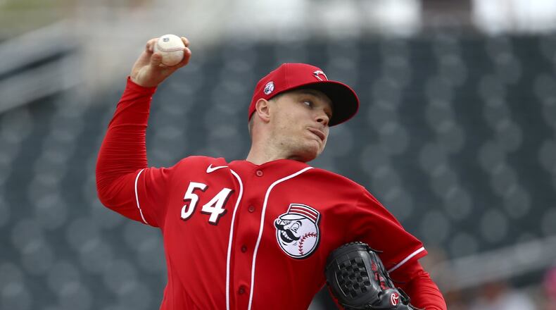 Cincinnati Reds starting pitcher Sonny Gray throws against the Los Angeles Dodgers during the first inning of a spring training baseball game Monday, March 2, 2020, in Goodyear, Ariz. (AP Photo/Ross D. Franklin)
