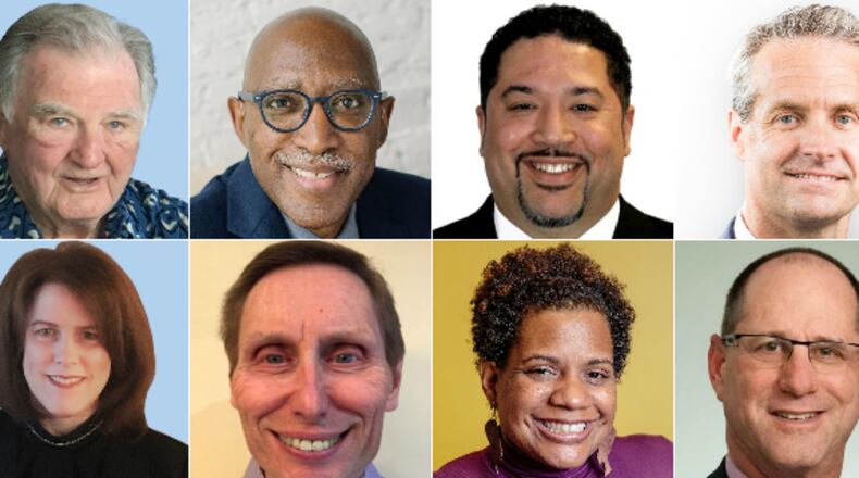 The honorees of the Springfield City School District "Alumni of Distinction" Award program. From left to right: Edgar Bircher, Michael Carter, Robert Chilton, Randall Comer, Krista Dellapina, Randy Ferryman, Ashley Griffin, Richard Nedelman. Lucas Gonzalez/Staff
