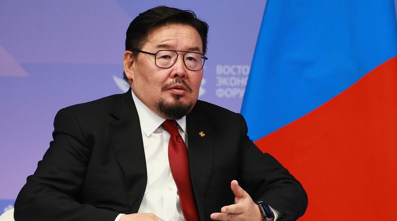 FILE -Mongolian Prime Minister Gombojavyn Zandanshatar speaks to Russian President Vladimir Putin during their meeting on the sidelines of the Eastern Economic Forum in Vladivostok, Russia, Sept. 4, 2025. (Vladimir Smirnov, Sputnik, Kremlin Pool Photo via AP, File)