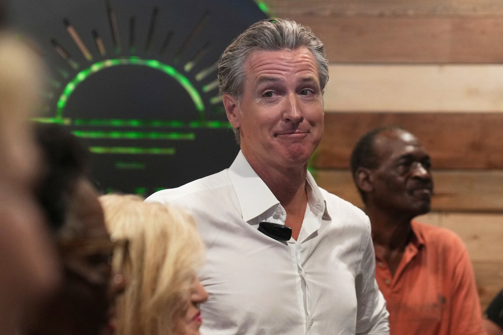 Gov. Gavin Newsom, D-Calif., waits to speak to a crowd at a coffee shop during a two-day swing through South Carolina on Tuesday, July 8, 2025, in Mullins, S.C. (AP Photo/Meg Kinnard)