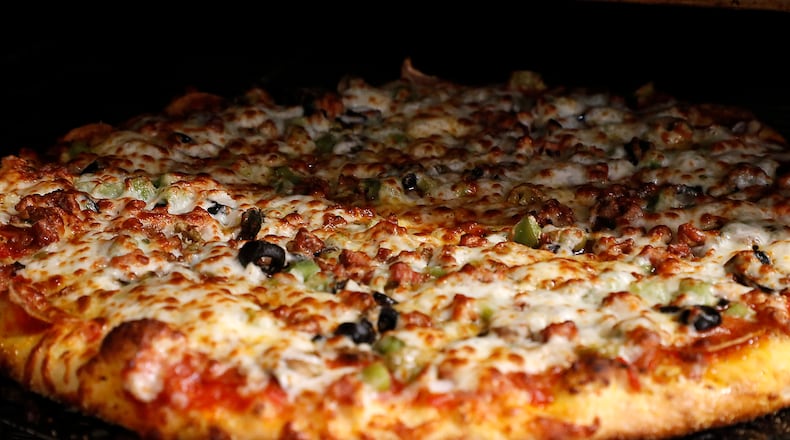 Feb. 9 is National Pizza Day in the U.S. Check out these three spots to pick up a pie for dinner tonight. Bill Lackey/Staff