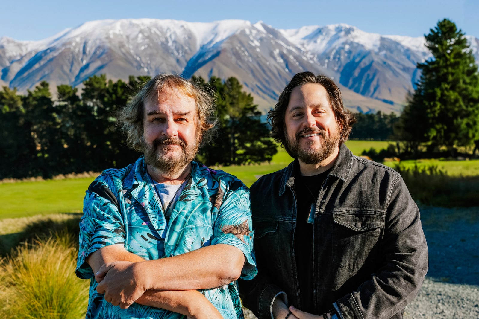 Filmmaker Peter Jackson, left, and Colossal CEO Ben Lamm poses for a photo outside Christchurch, New Zealand, in 2025. (Courtesy of Colossal Biosciences via AP)