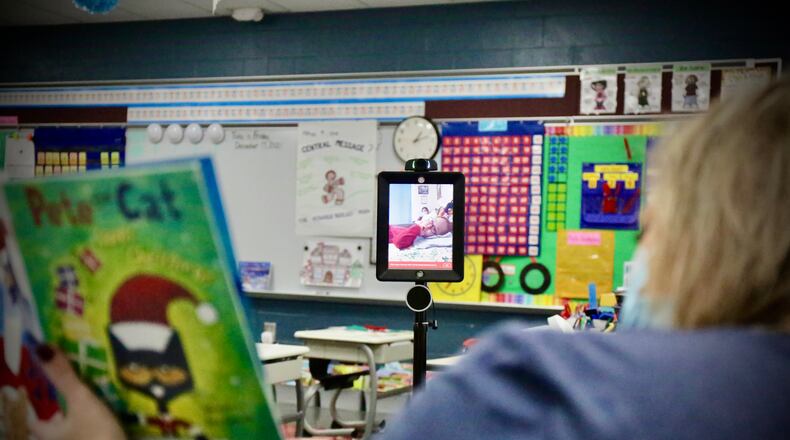 Elliette “Ellie” Miller, 8, tunes into her classes at Warder Park-Wayne Elementary School through the use of double robotic technology. Photo provided by Springfield City School District.