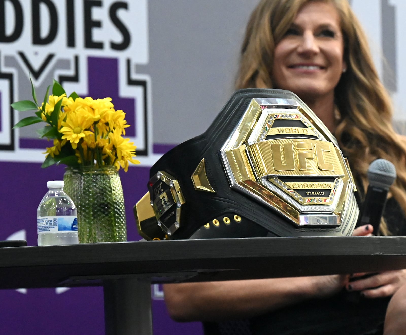 Middletown native and recently crowned UFC Women's Bantamweight Champion Kayla Harrison returned to her hometown  on Thursday, July 10, 2025. She spoke to hundreds that attended Wade E. Miller gym at Middletown High School where she donated $5,000 to Hope House Mission and received a key to the city. MICHAEL D. PITMAN/STAFF