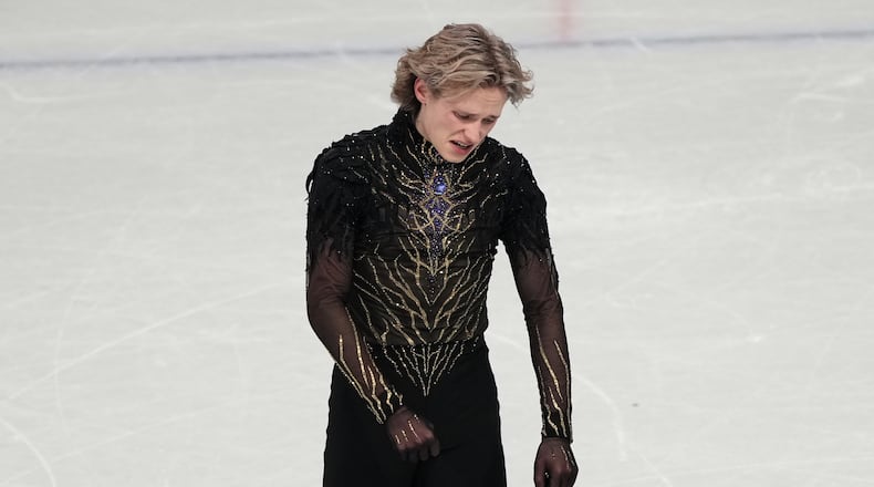 Ilia Malinin of the United States reacts at the end of his program after competing during the men's free skate program in figure skating at the 2026 Winter Olympics, in Milan, Italy, Friday, Feb. 13, 2026. (AP Photo/Francisco Seco)