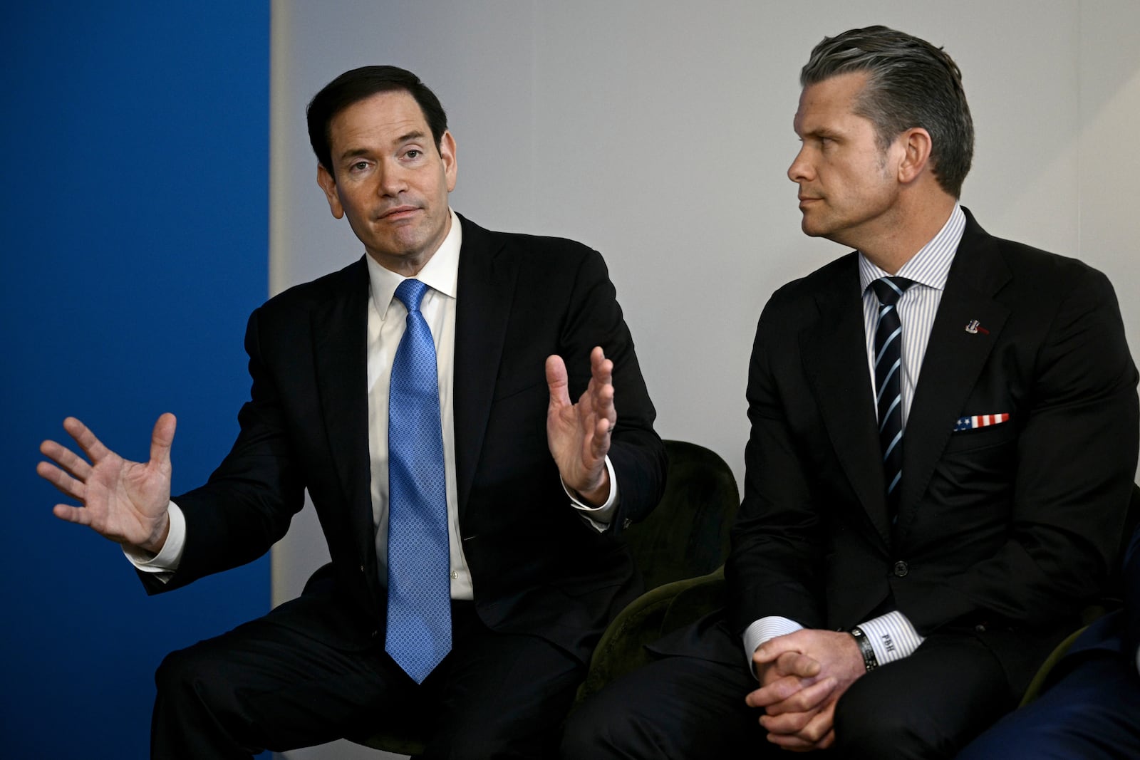 U.S. Secretary of State Marco Rubio, left, speaks next to U.S. Defense Secretary Pete Hegseth during a meeting between U.S. President Donald Trump with NATO Secretary General Mark Rutte at the NATO summit of heads of state and government in The Hague, Netherlands, Wednesday, June 25, 2025.(Brendan Smialowski/Pool Photo via AP)