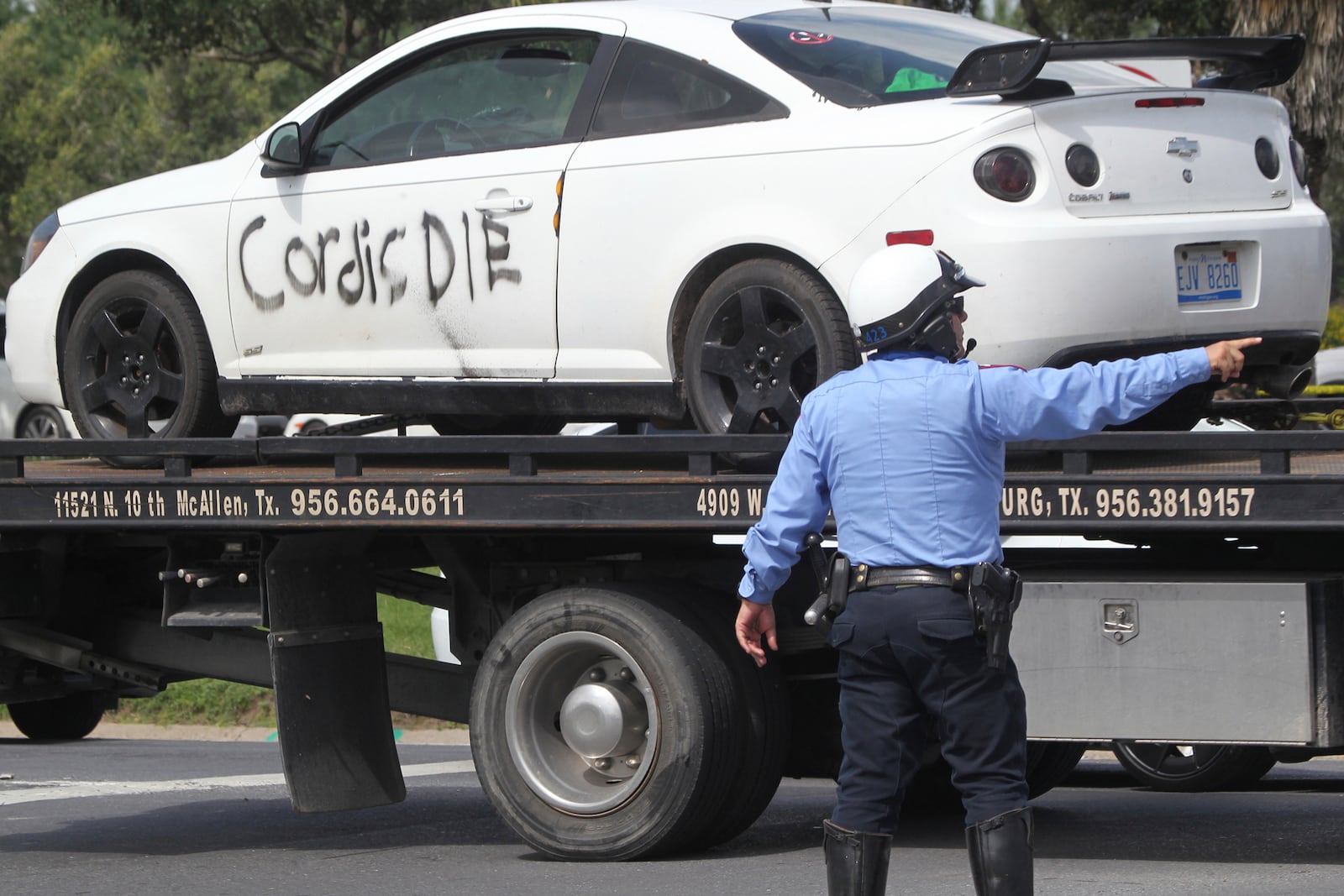 Vehicle belonging to suspect car is towed away from the scene at Rio Grande Valley Border Patrol Sector Annex, Monday, July 7, 2025, McAllen, Texas. (Delcia Lopez/The Monitor via AP)