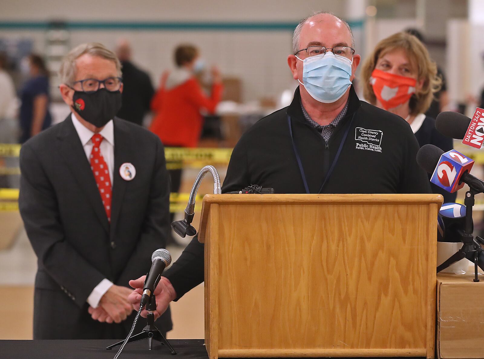 Clark County Health Commissioner Charles Patterson speaks to the media after giving Governor Mike DeWine and his wife, Fran, a tour of the Clark County COVID vaccine distribution center at the Upper Valley Mall Thursday. BILL LACKEY/STAFF