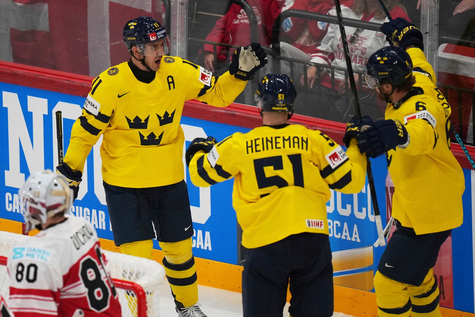 Swedish players celebrate after a goal during the bronze medal match between Denmark and Sweden at the ice hockey world championships in Stockholm, Sweden, Sunday, May 25, 2025. (AP Photo/Petr David Josek)