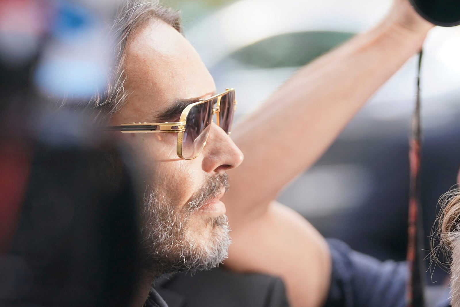 Russell Brand arrives at Westminster Magistrates' court in London, Friday, May 2, 2025, where he faces, rape and sexual assault charges involving four women. (AP Photo/Alberto Pezzali)