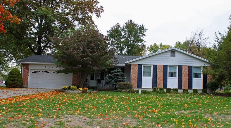 The 3-bedroom, brick ranch offers a full, unfinished basement and updated kitchen. The home has about 1,700 sq. ft. of living space with an attached, 2-car garage. CONTRIBUTED PHOTO BY VICKIE KAPNAS