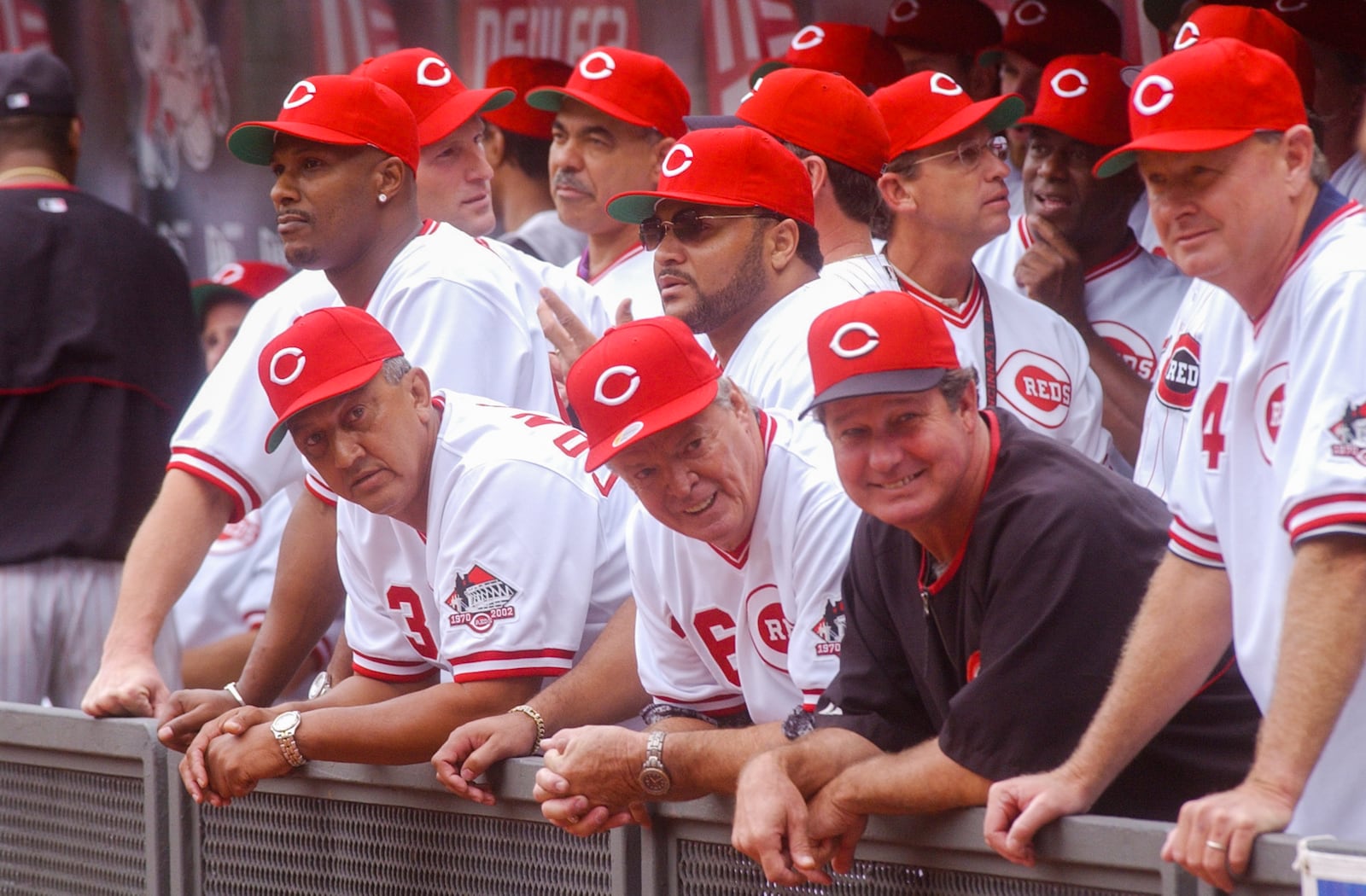 GREG LYNCH/JOURNALNEWS
Former Reds players including Eric Davis, Dave Concepcion, Don Gullett, and Jack Billingham and others, wait in the Reds dugout prior to post-game festivities following the final game at Cinergy Field, Sunday.
