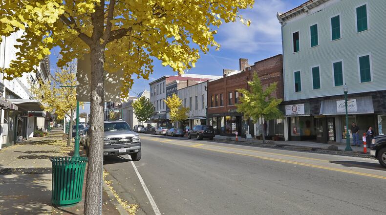 The Monument Square District invites shoppers to get that early start at its Holiday Open House this weekend in downtown Urbana. BILL LACKEY/STAFF