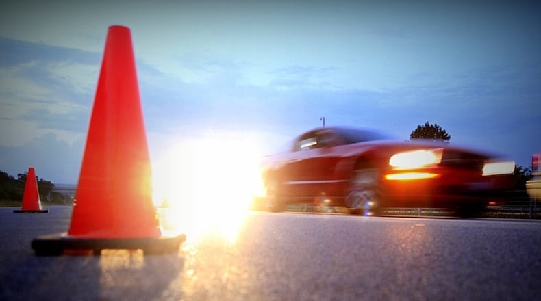 A single-vehicle rollover crash Wednesday night on southbound Interstate 675 in Beavercreek sent the driver to the hospital and backed up traffic.