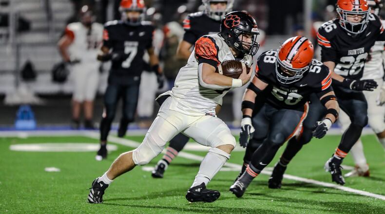 West Liberty-Salem High School senior Josh Wilcoxon runs the ball during their Division V state semifinal game against Ironton on Friday night at Chillicothe High School's Hernnstein Field. Ironton won 63-7. Michael Cooper/CONTRIBUTED