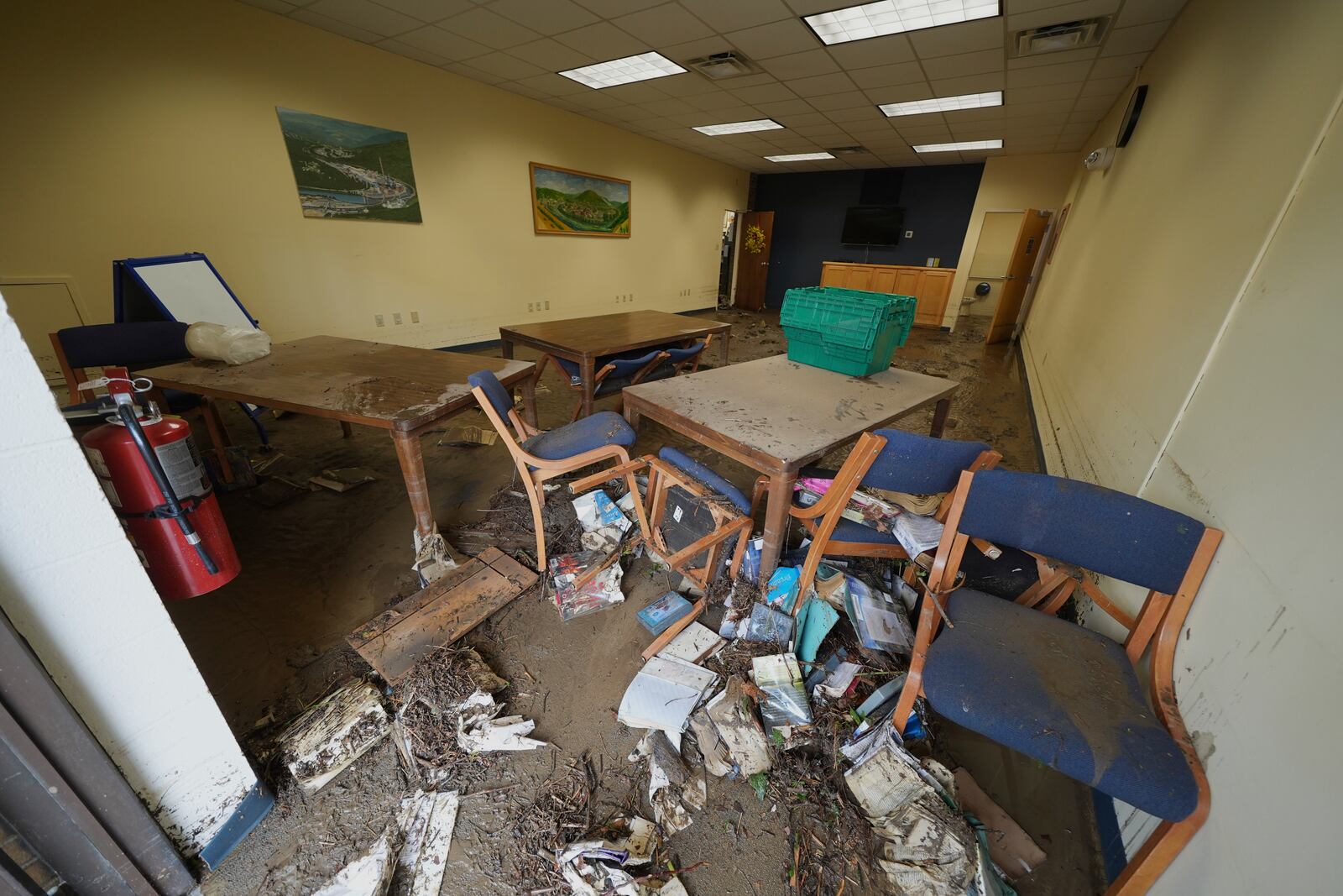 The inside of the Westernport Library is damaged as clean up continues after flooding on Wednesday, May 14, 2025 in Westernport, Md. (AP Photo/Gene J. Puskar)