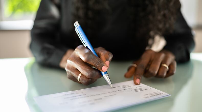 Checks account for less than nine percent of payments but 66 percent of payment fraud, according to the Association of Fraud Professionals. iSTOCK/COX