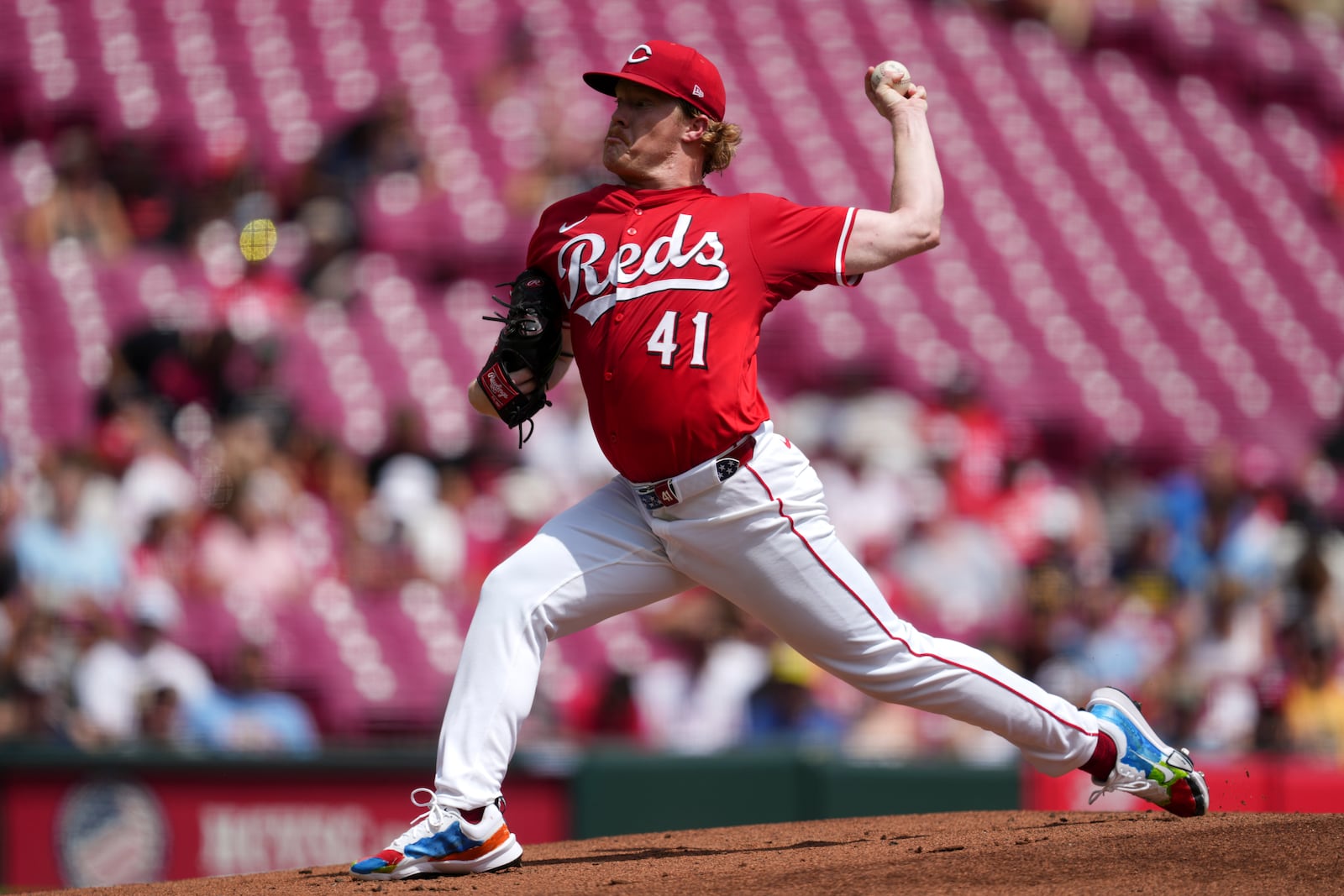 Cincinnati Reds pitcher Andrew Abbott throws in the first inning of a baseball game against the Milwaukee Brewers, Sunday, Aug. 17, 2025, in Cincinnati. (AP Photo/Grace Bradley)