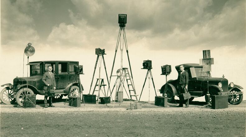 Local photographers document their community, capturing the everyday and documenting history for future generations. Howard A. Weber was an early pioneer in developing new photographic techniques. He had worked with officials at Wright Patterson Air Force Base on improving aerial photography and even flew with Amelia Earhart to take photos. He worked for the Springfield News Sun and then went on to spend more than 25 years in commercial photography, working much of the time with a partner, C.O. Harrison, shown on the right in the 1930s. Howardâs son, Howard O., better known as âHowdyâ was a well-known local photographer and character. PHOTO COURTESY OF THE CLARK COUNTY HISTORICAL SOCIETY