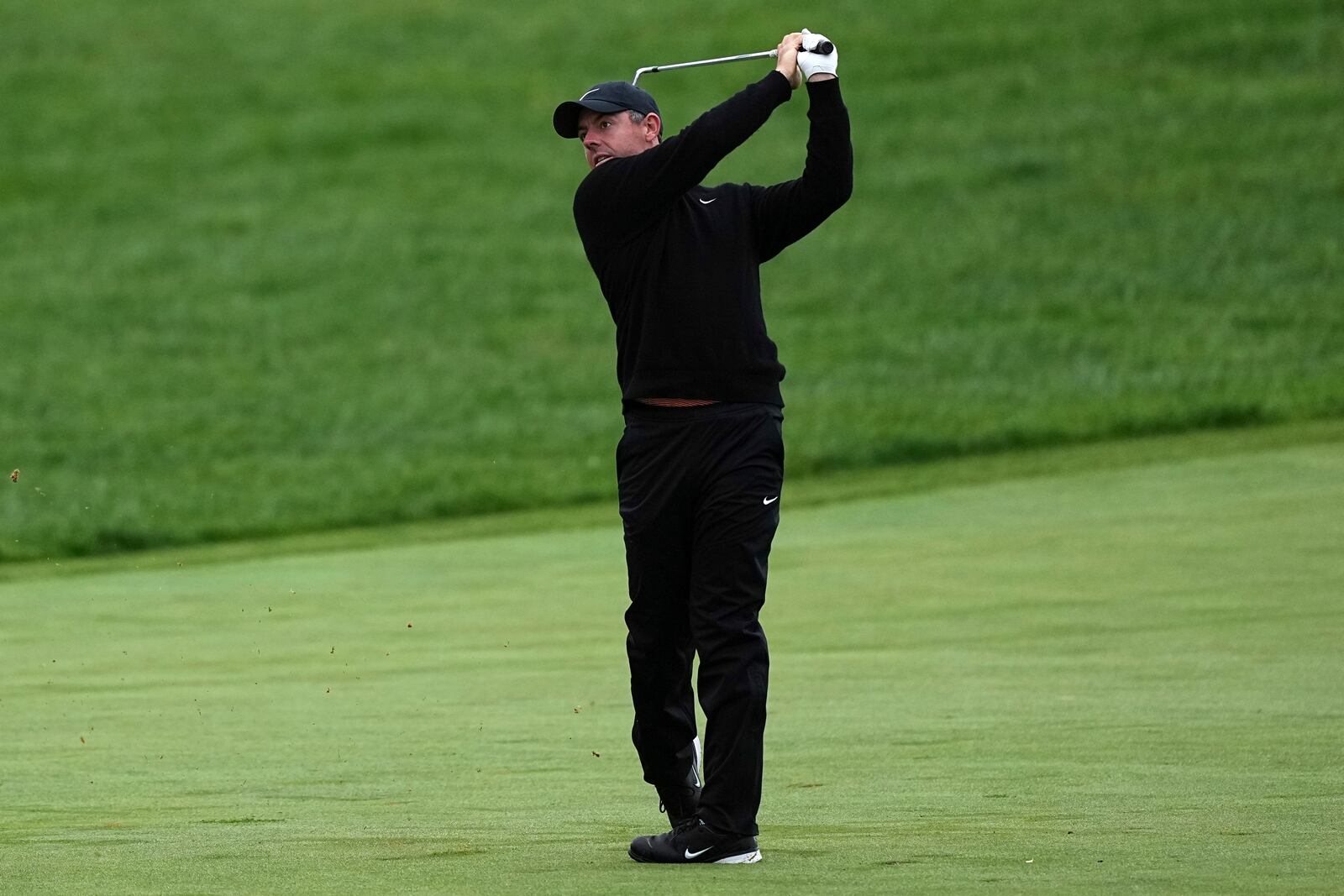 Rory McIlroy, of Northern Ireland, hits on the 13th hole during the second round of the Truist Championship golf tournament at the Philadelphia Cricket Club, Friday, May 9, 2025, in Flourtown. (AP Photo/Matt Rourke)