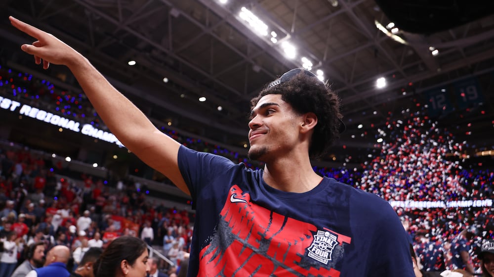 Arizona forward Koa Peat celebrates after a win over Purdue in the Elite Eight of the NCAA college basketball tournament, Saturday, March 28, 2026, in San Jose, Calif. (AP Photo/Kelley L Cox)