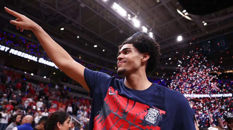 Arizona forward Koa Peat celebrates after a win over Purdue in the Elite Eight of the NCAA college basketball tournament, Saturday, March 28, 2026, in San Jose, Calif. (AP Photo/Kelley L Cox)