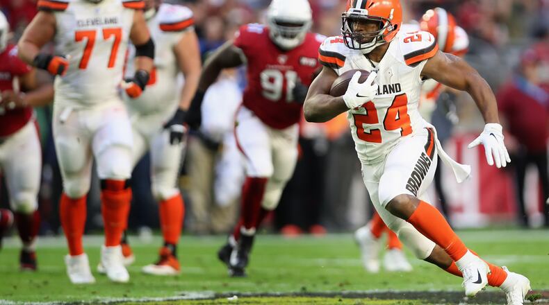 Running back Nick Chubb #24 of the Cleveland Browns rushes the football against the Arizona Cardinals during the first half of the NFL game at State Farm Stadium on December 15, 2019 in Glendale, Arizona. The Cardinals defeated the Browns 38-24. (Photo by Christian Petersen/Getty Images)