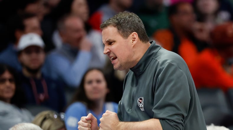 North Carolina State head coach Will Wade reacts during the second half of an NCAA college basketball game against Virginia in the quarterfinals of the Atlantic Coast Conference tournament in Charlotte, N.C., Thursday, March 12, 2026. (AP Photo/Nell Redmond)