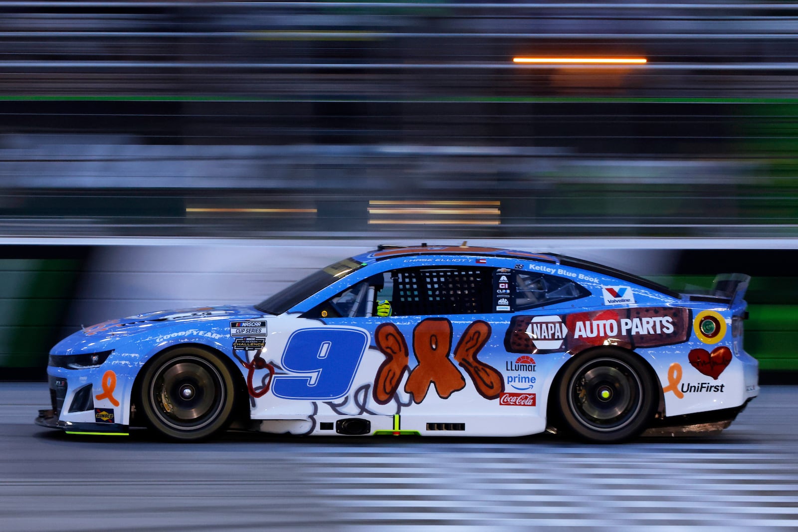 Driver Chase Elliott (9) moves along the track during a NASCAR Cup Series auto race, Saturday, June 28, 2025, in Hampton, Ga. (AP Photo/Butch Dill)