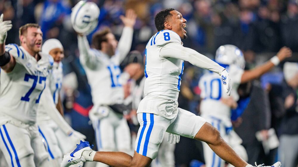 Duke wide receiver Jayden Moore (8) reacts after winning the Atlantic Coast Conference championship NCAA college football game against Virginia, Saturday, Dec. 6, 2025, in Charlotte, N.C. (AP Photo/Jacob Kupferman)