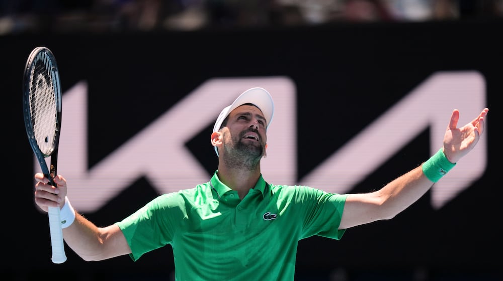 Novak Djokovic of Serbia reacts during his second round match against Francesco Maestrelli of Italy at the Australian Open tennis championship in Melbourne, Australia, Thursday, Jan. 22, 2026. (AP Photo/Aaron Favila)