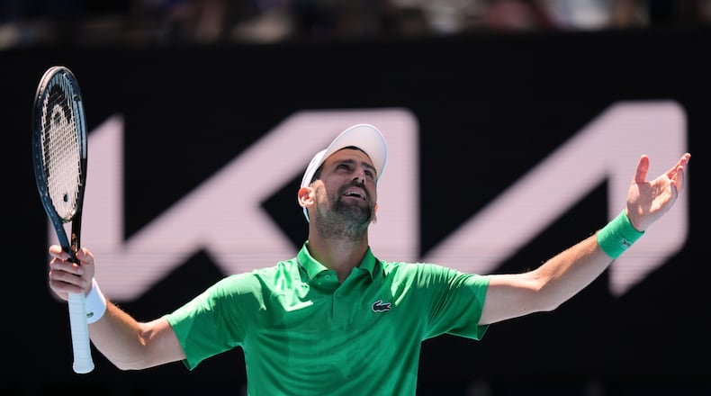 Novak Djokovic of Serbia reacts during his second round match against Francesco Maestrelli of Italy at the Australian Open tennis championship in Melbourne, Australia, Thursday, Jan. 22, 2026. (AP Photo/Aaron Favila)