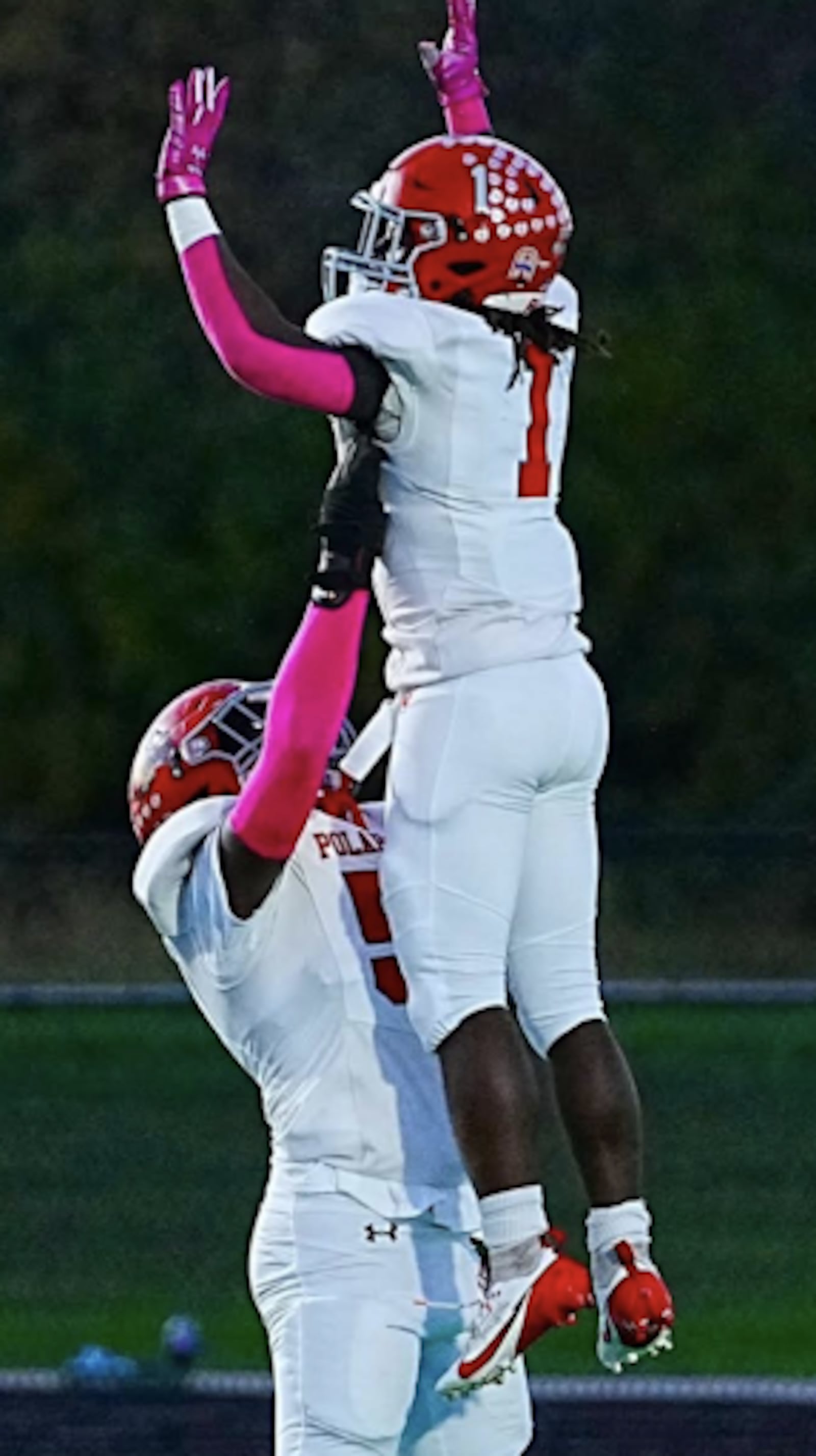 Junior #50 Carter Dunford lifting up Senior #1 Teon Hill after scoring his 4th Touchdown against Bethel.