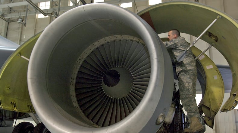 Tech. Sgt. Stefan Sianis inspects a KC-135R Stratotanker F108-100 engine before it is lowered from the aircraft in this 2010 file photo at McConnell Air Force Base, U.S. Air Force photo/Senior Airman Abigail Klein)