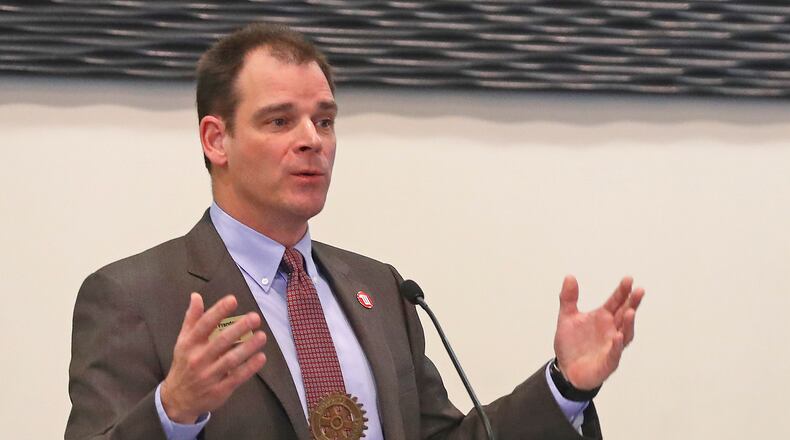 Mike Frandsen, the president of Wittenberg University, talks about the future of the University during the Springfield Rotory Club’s weekly meeting. Bill Lackey/Staff