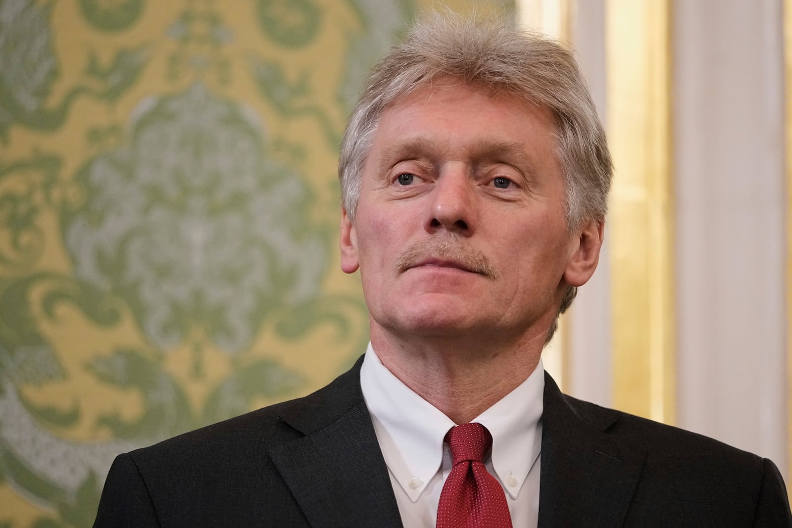 FILE - Kremlin spokesman Dmitry Peskov waits at the Grand Kremlin Palace at the Kremlin in Moscow, Russia, June 23, 2025. (AP Photo/Pavel Bednyakov, Pool, file)