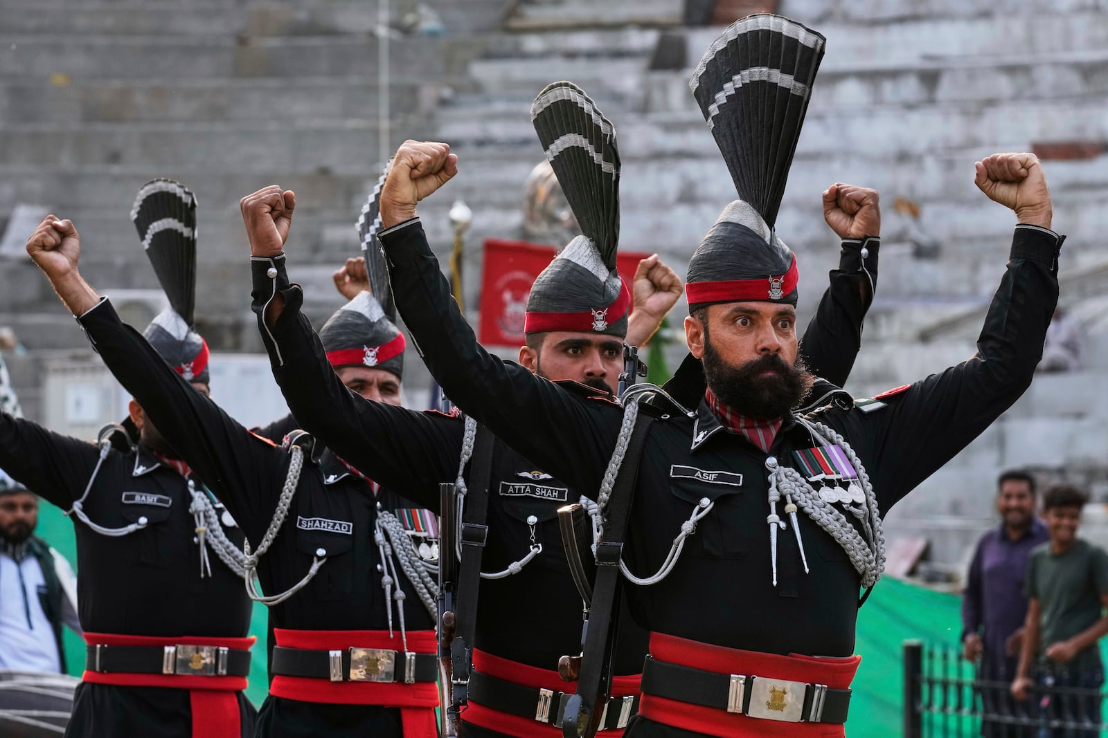 Pakistan's Rangers soldiers gesture during a daily closing ceremony at the Wagah, a joint post on the Pakistan and India border, near Lahore, Pakistan, Saturday, May 3, 2025. (AP Photo/K.M. Chaudary)