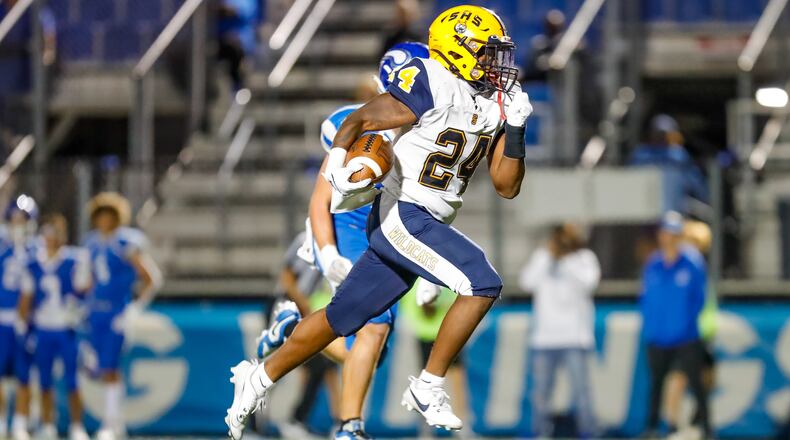 Springfield's Deontre Long breaks free for a touchdown during a game against Miamisburg on Friday night at Holland Field. The Wildcats won 30-27. Michael Cooper/CONTRIBUTED