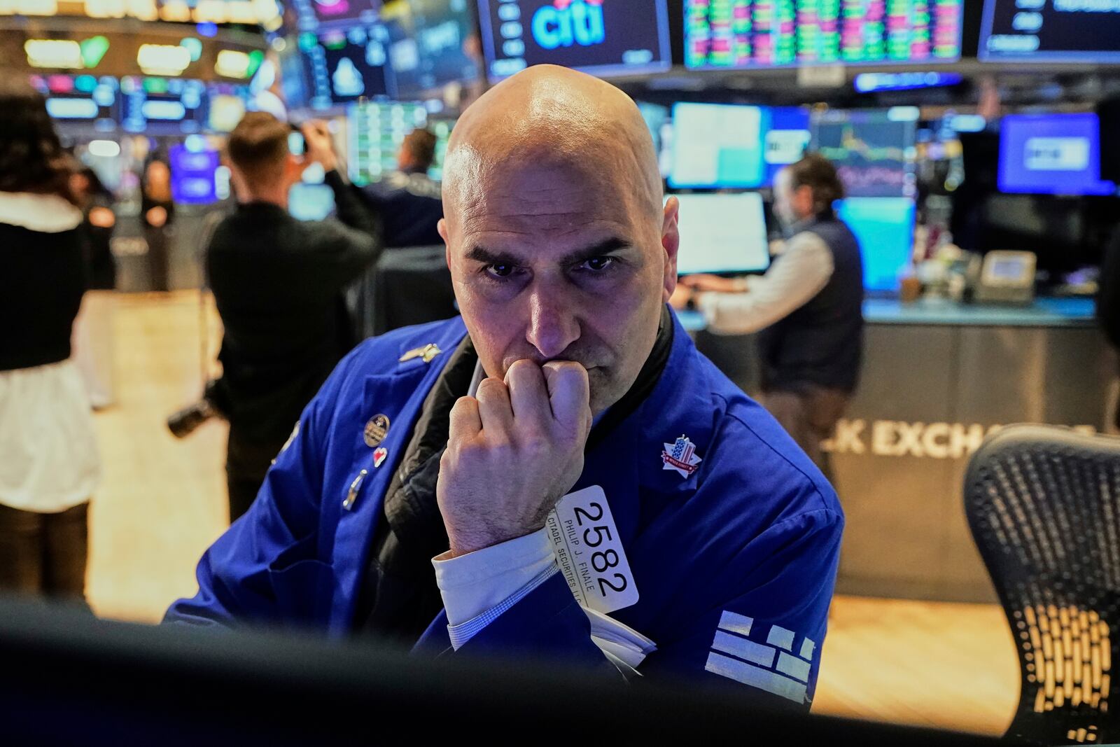 Specialist Philip Finale works at his post on the floor of the New York Stock Exchange, Tuesday, April 15, 2025. (AP Photo/Richard Drew)