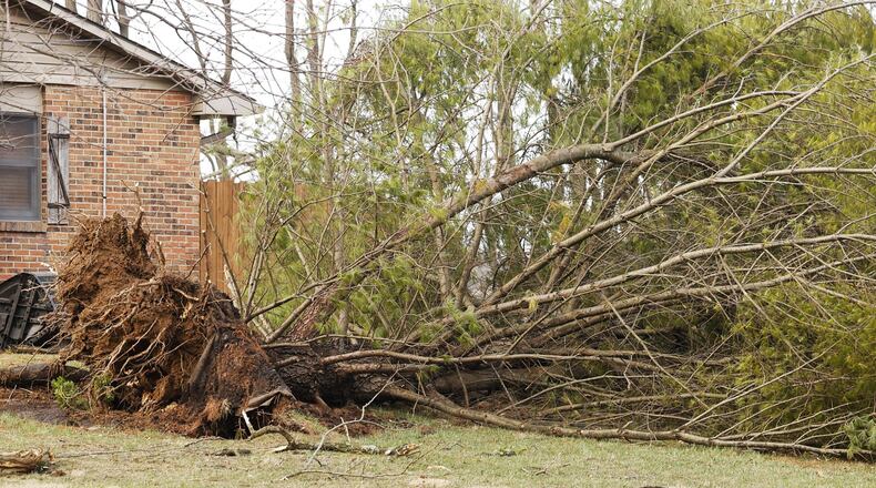 A tornado damaged several houses and knocked down trees and power lines on West Alexandria Road in Madison Township in Butler County Monday, Feb. 27, 2023. NICK GRAHAM/STAFF