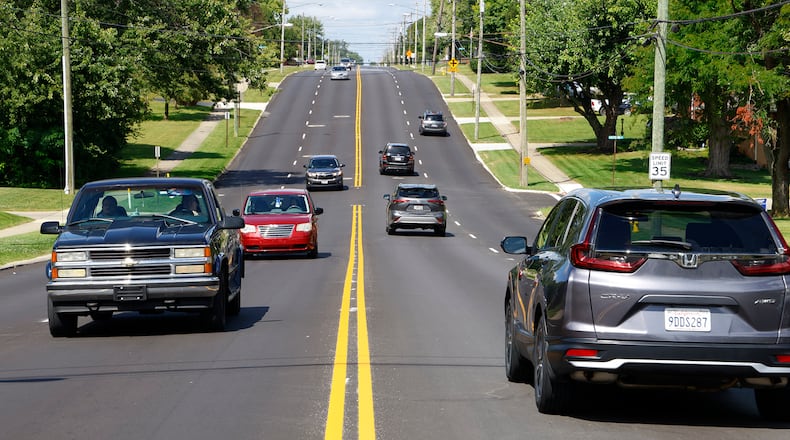 Traffic moves freely on Derr Road between Villa Road and Home Road Friday, Sept 8, 2023, as the orange cones have been removed marking the road project's completion. The city of Springfield has been working on the $1.4 million project since April. BILL LACKEY/STAFF BILL LACKEY/STAFF