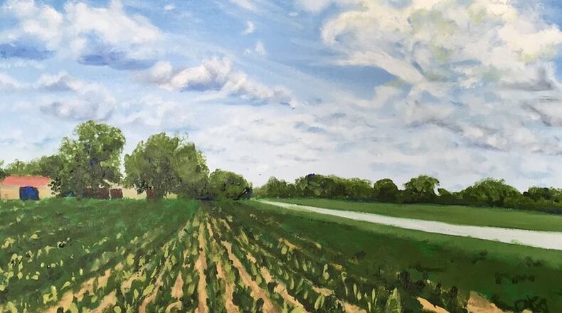 A ‘skyscape’ painting, ‘Early Corn’ by Urbana artist and teacher Leigh Ann Inskeep-Simpson.