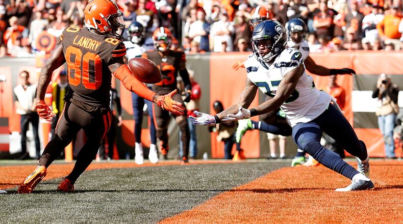 CLEVELAND, OH - OCTOBER 13: Tedric Thompson #33 of the Seattle Seahawks intercepts a pass that was intended for Jarvis Landry #80 of the Cleveland Browns during the second quarter at FirstEnergy Stadium on October 13, 2019 in Cleveland, Ohio. (Photo by Kirk Irwin/Getty Images)