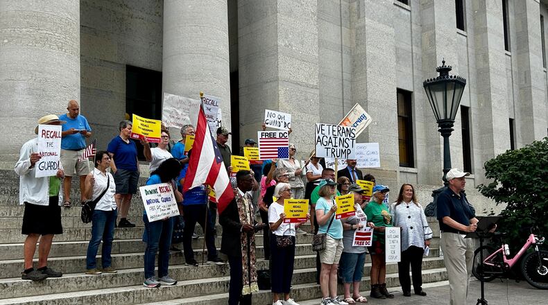 Activists gathered outside the Ohio Statehouse on Wednesday in opposition of Gov. Mike DeWine's decision to send 150 Ohio National Guard troops to Washington, D.C. to take part in an anti-crime mission championed by President Donald Trump. Wednesday, Aug. 20, 2025.