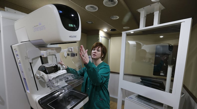 Selena Kemper, supervisor of the Mammography Department Community Mercy Health Partners, talks about the 3D mammography machine in the new Mobile Mammography Unit Friday, Jan. 13, 2017. Bill Lackey/Staff