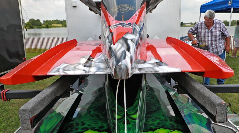 Ed Weinert, of McConnelsville, Ohio, gets his boats ready Friday for the Quake the Quarry outboard boat races this weekend at Champions Park Lake. BILL LACKEY/STAFF