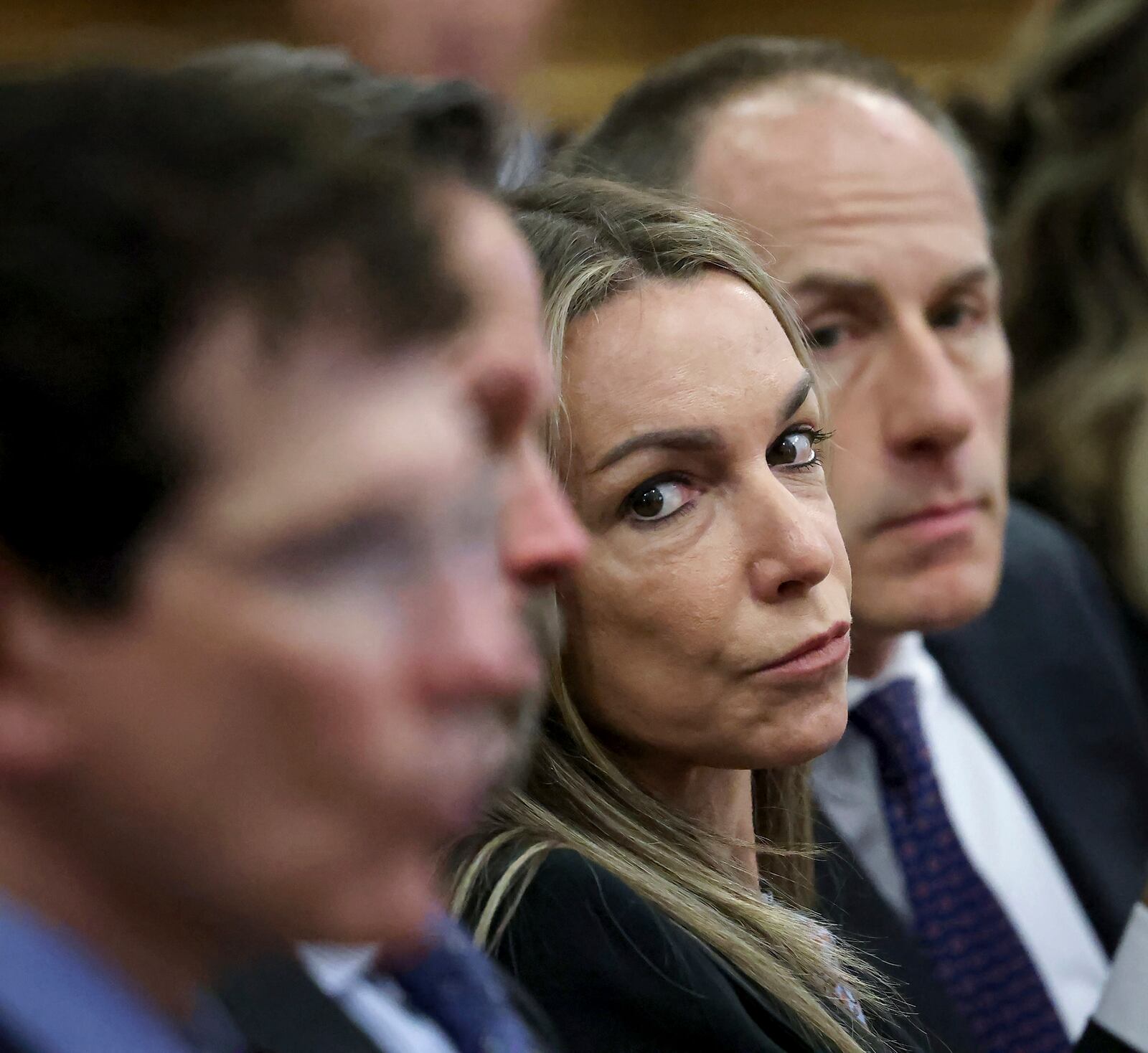 Defendant Karen Read sits with her defense team including David Yannetti, right, during closing arguments in her murder trial in Norfolk Superior Court, Friday, June 13, 2025, in Dedham, Mass. (Mark Stockwell/The Sun Chronicle via AP, Pool)