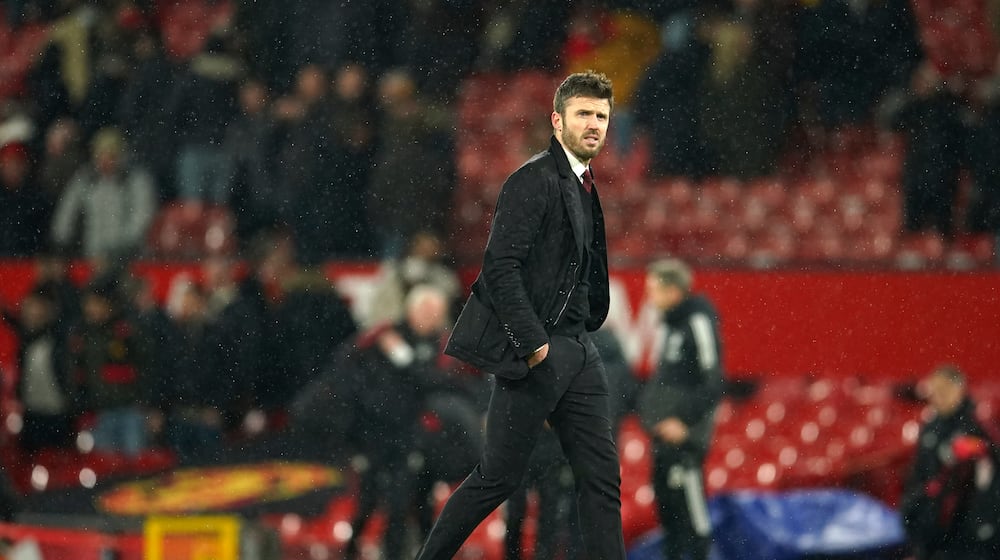 FILE - Manchester United's temporary coach Michael Carrick walks off the pitch at the end of the English Premier League soccer match between Manchester United and Arsenal at Old Trafford stadium in Manchester, England, Thursday, Dec. 2, 2021. (AP Photo/Dave Thompson, File)