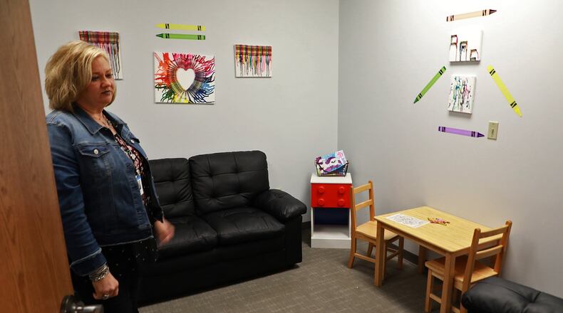 Carlisa Parker, of the Clark County Family & Children’s Services, talks about the Interview Room at the Clark County Child Advocacy Center. BILL LACKEY/STAFF